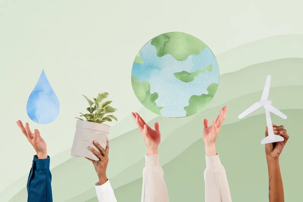 Diverse hands presenting symbols of sustainability: water, plant, earth, wind turbine