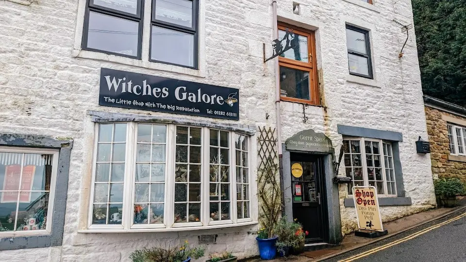Whitewashed stone building housing the Witches Galore gift shop near Pendle Hill, Lancashire