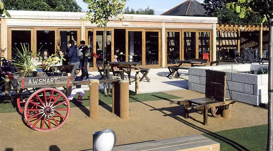 The Garden Cafรฉ building and patio area at Stockwood Discovery Centre in Luton
