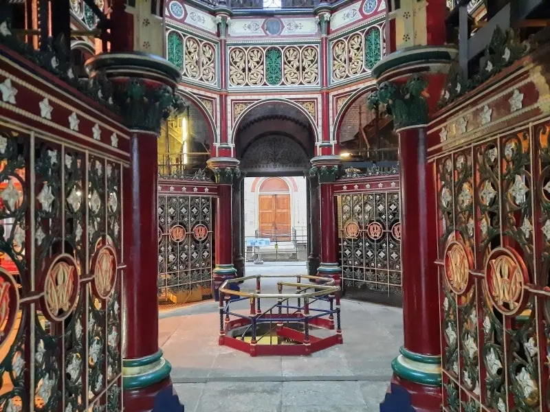 Intricate and colourful Victorian ornamental ironwork inside the Crossness Pumping Station engine house