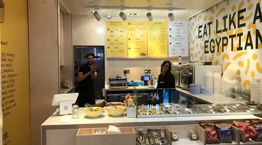 Staff serving customers at the Koshari Street counter in London