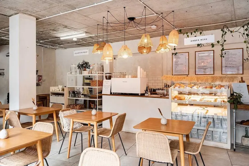 The bright, Scandinavian-style interior of WAVE (We Are Vegan Everything) cafe in Hackney