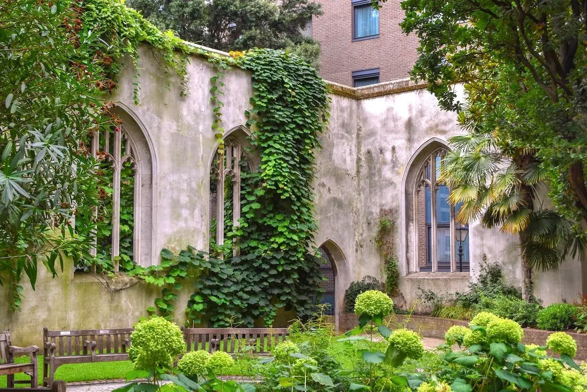 Ivy-covered church ruins creating a secret garden at St Dunstan-in-the-East, one of London's hidden Parks in London