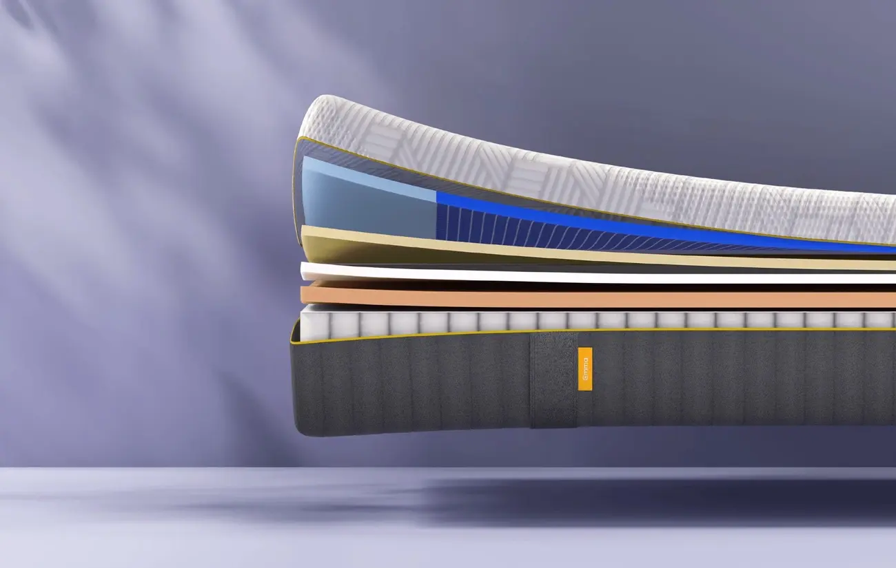 Cutaway view showing the different foam and spring layers inside an Emma mattress