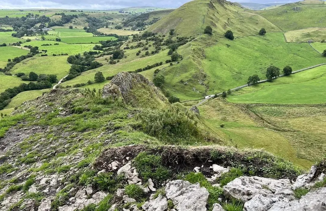 iew along the rocky ridge towards Chrome Hill (Dragon's Back) in the Peak District