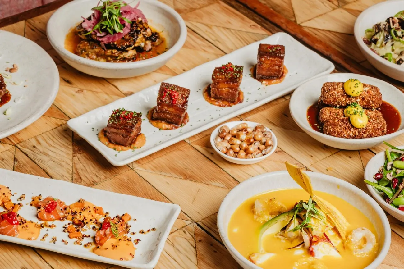 Close-up of a succulent Peruvian pork belly dish with garnish from Señor Ceviche
