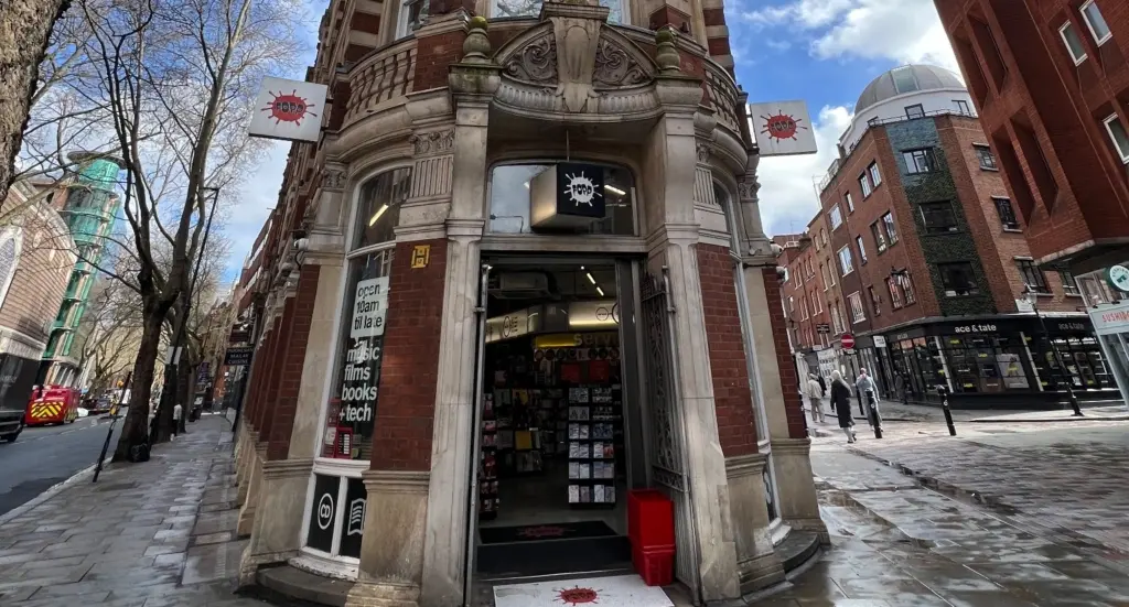 The entrance to the Fopp record store, situated on a street corner in a red-brick building in London