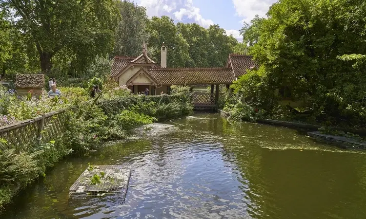 Picturesque Duck Island Cottage beside the lake in St James's Park, one of the Royal Parks in London