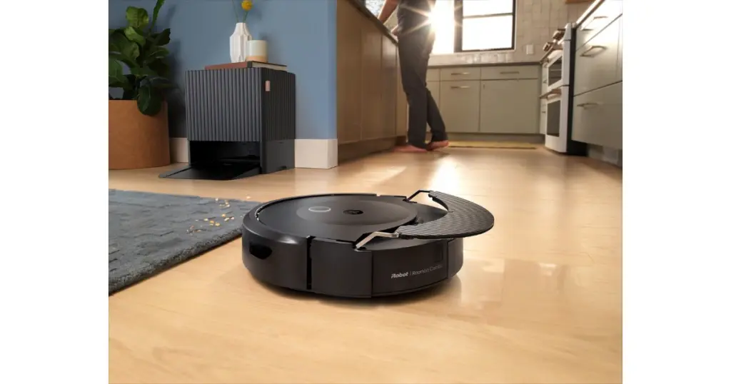 iRobot Roomba Combo 10 Max Robot Vacuum cleaning a wooden kitchen floor